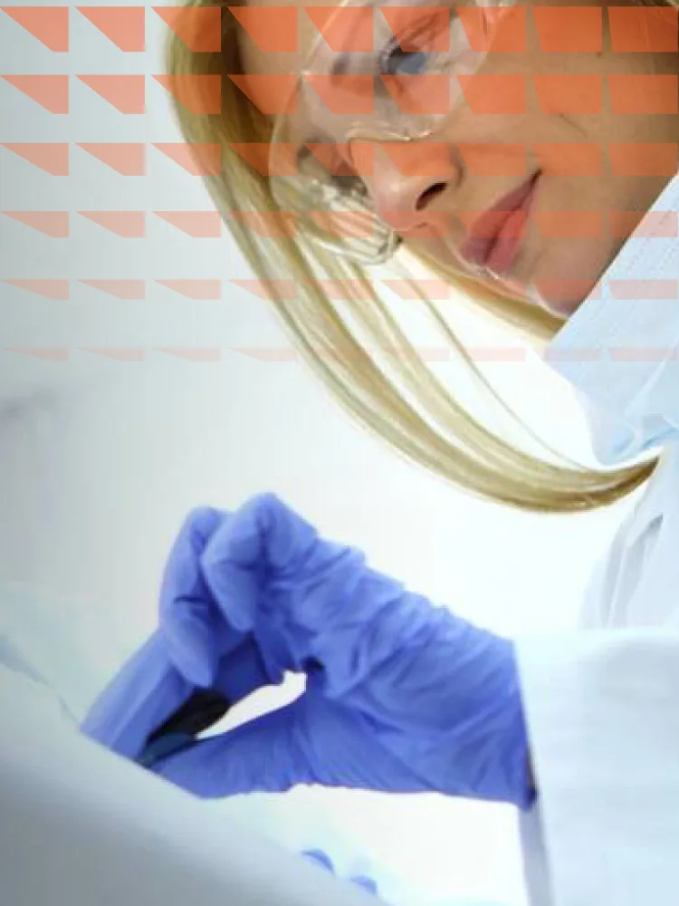 Woman in lab coat doing medical test