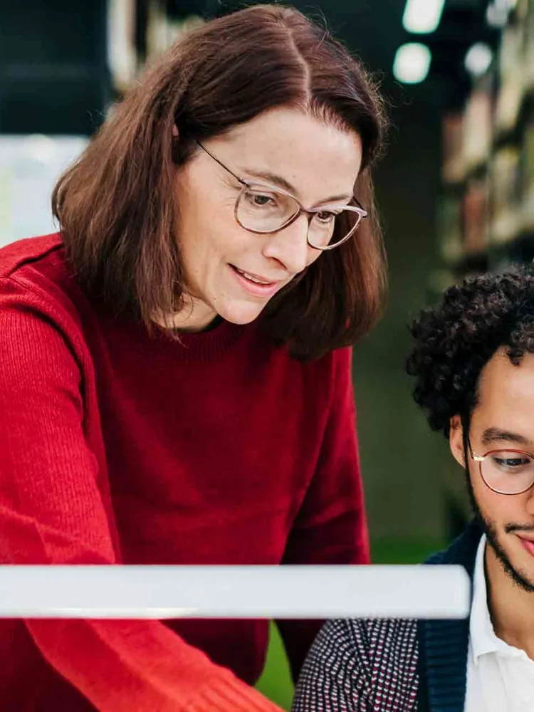 librarian-helping-student