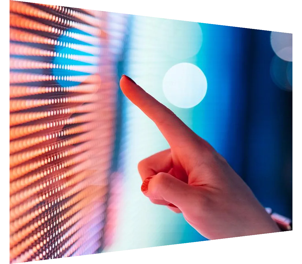 Close-up of female hand touching illuminated digital display