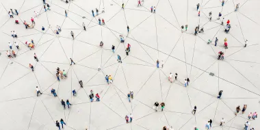 Aerial view of people connected by network lines