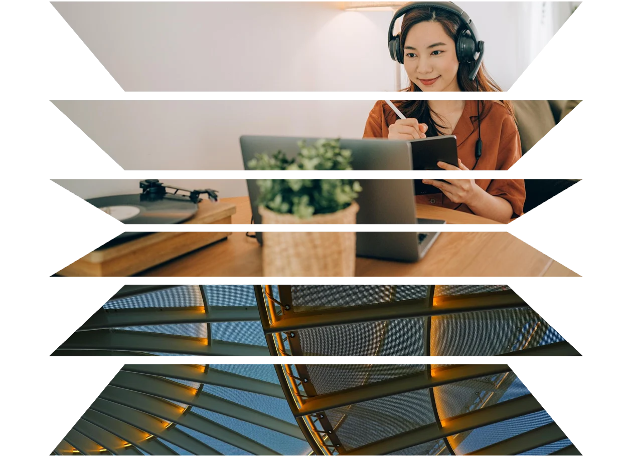 Asian woman wearing headphones for an online meeting at home