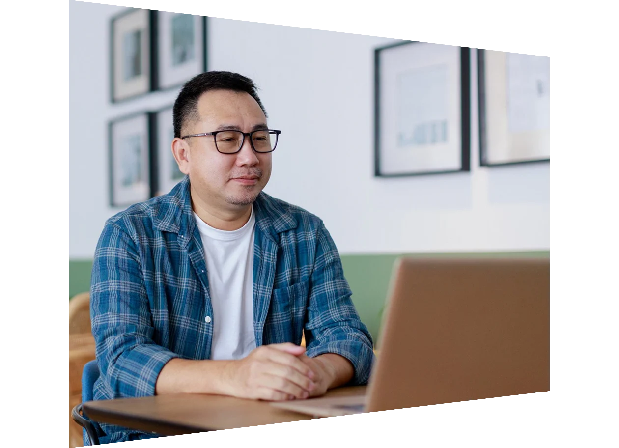 Reviewer in home office looking at computer