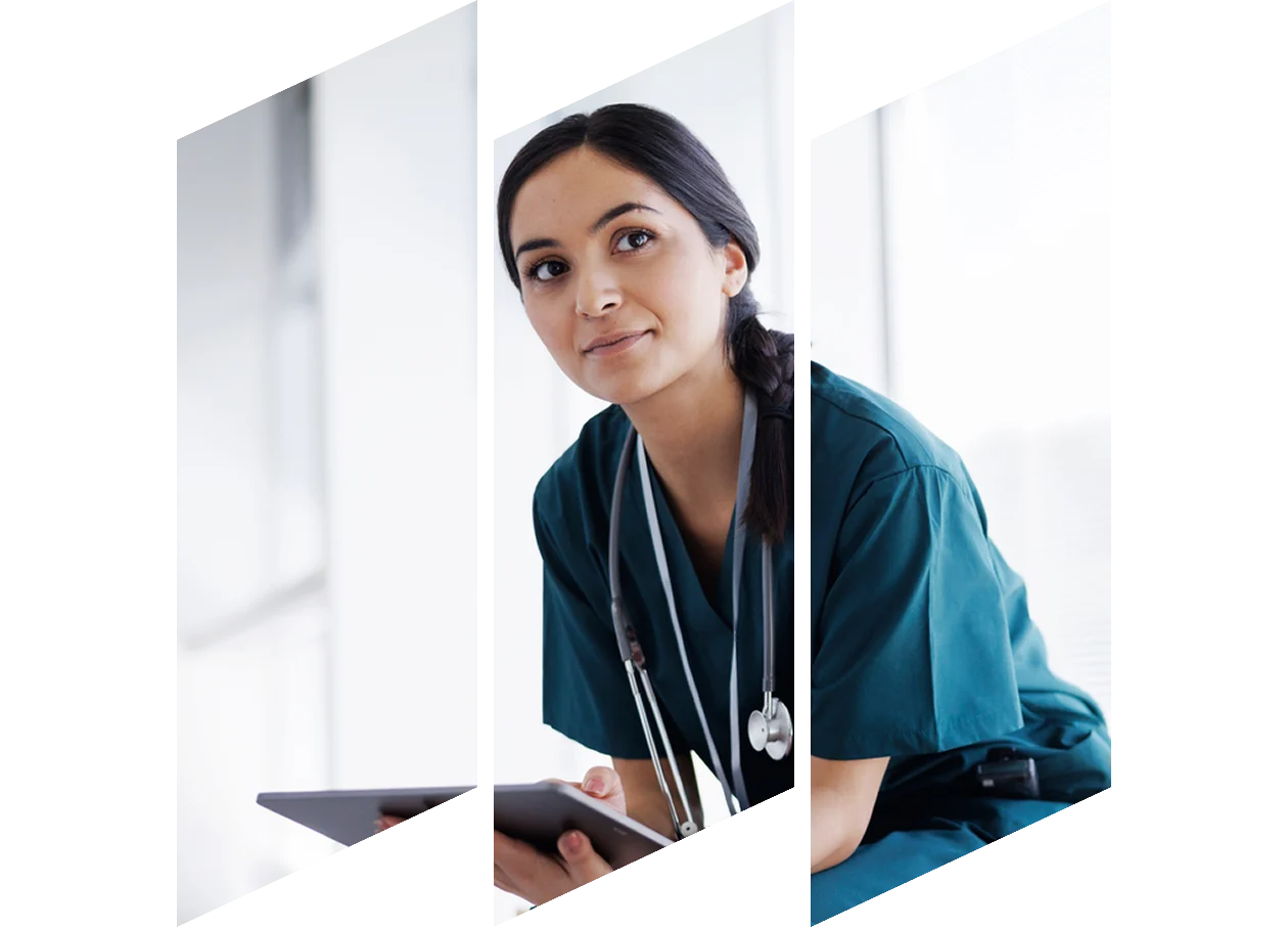Female healthcare professional looking at a digital tablet