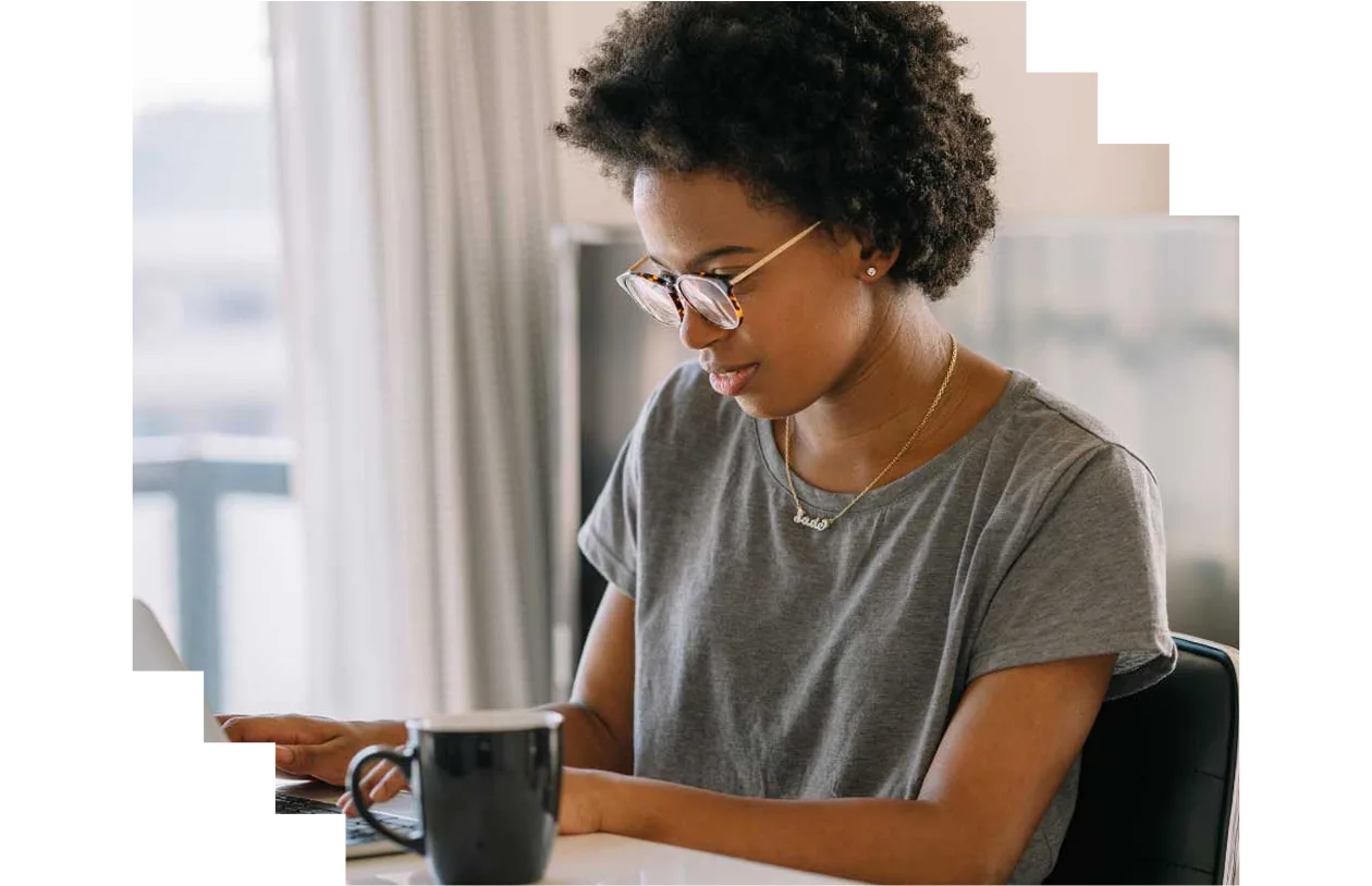 Young African-American student working on a laptop