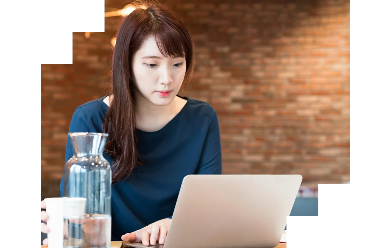 Woman on a laptop working on a project.