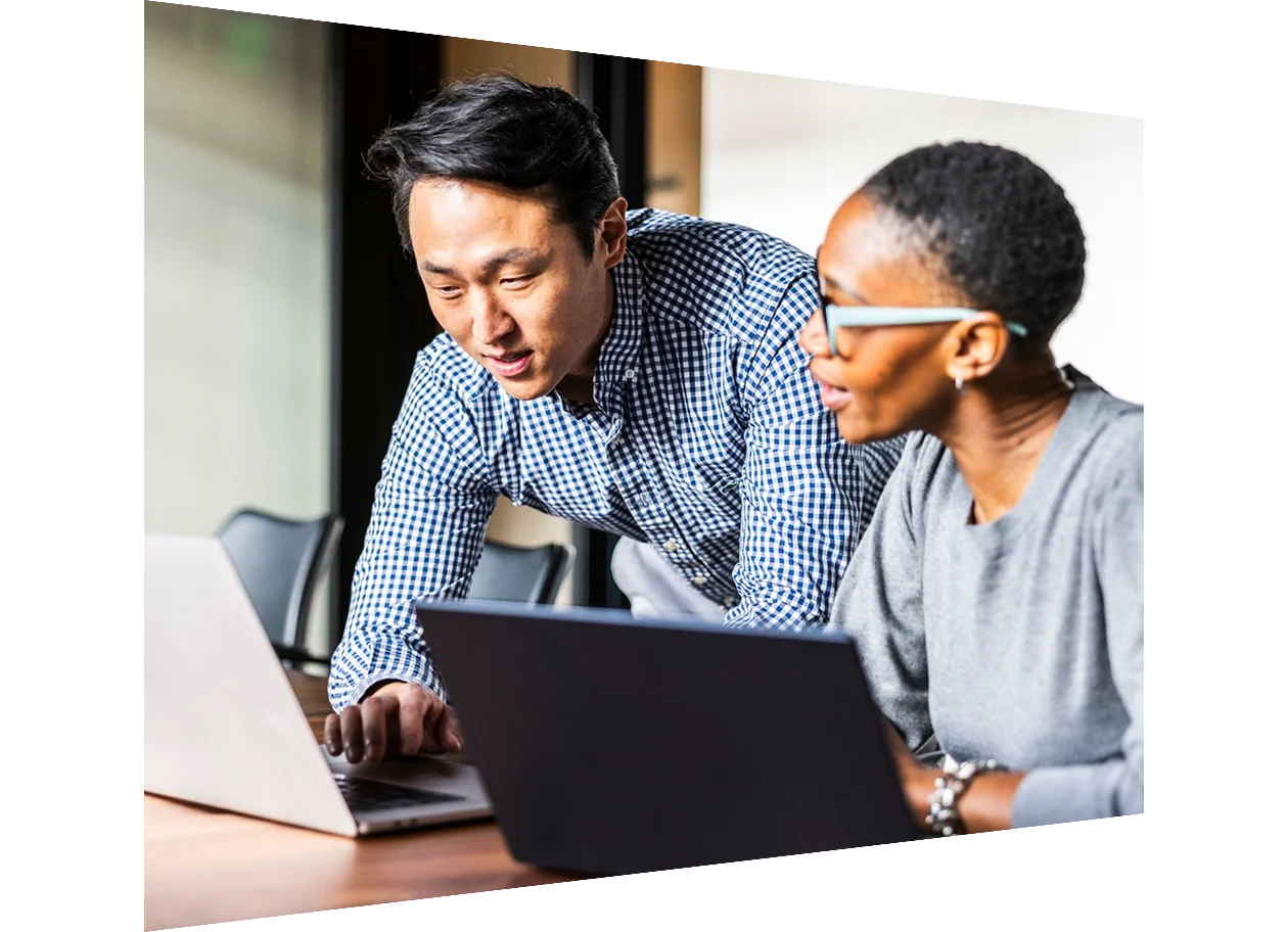 Woman sitting across from another woman, looking at each other