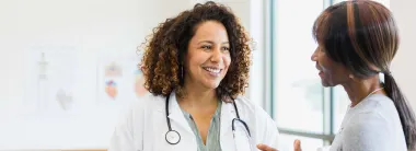 Clinician of the Future Hub Banner: Physician smiling and talking with patient