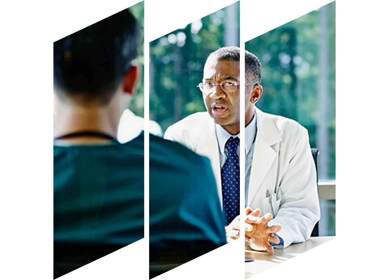 Doctor discussing a case with other medical professionals