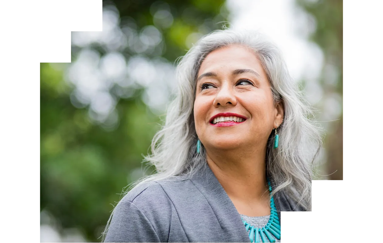 A portrait of a senior Mexican female administrator on a campus