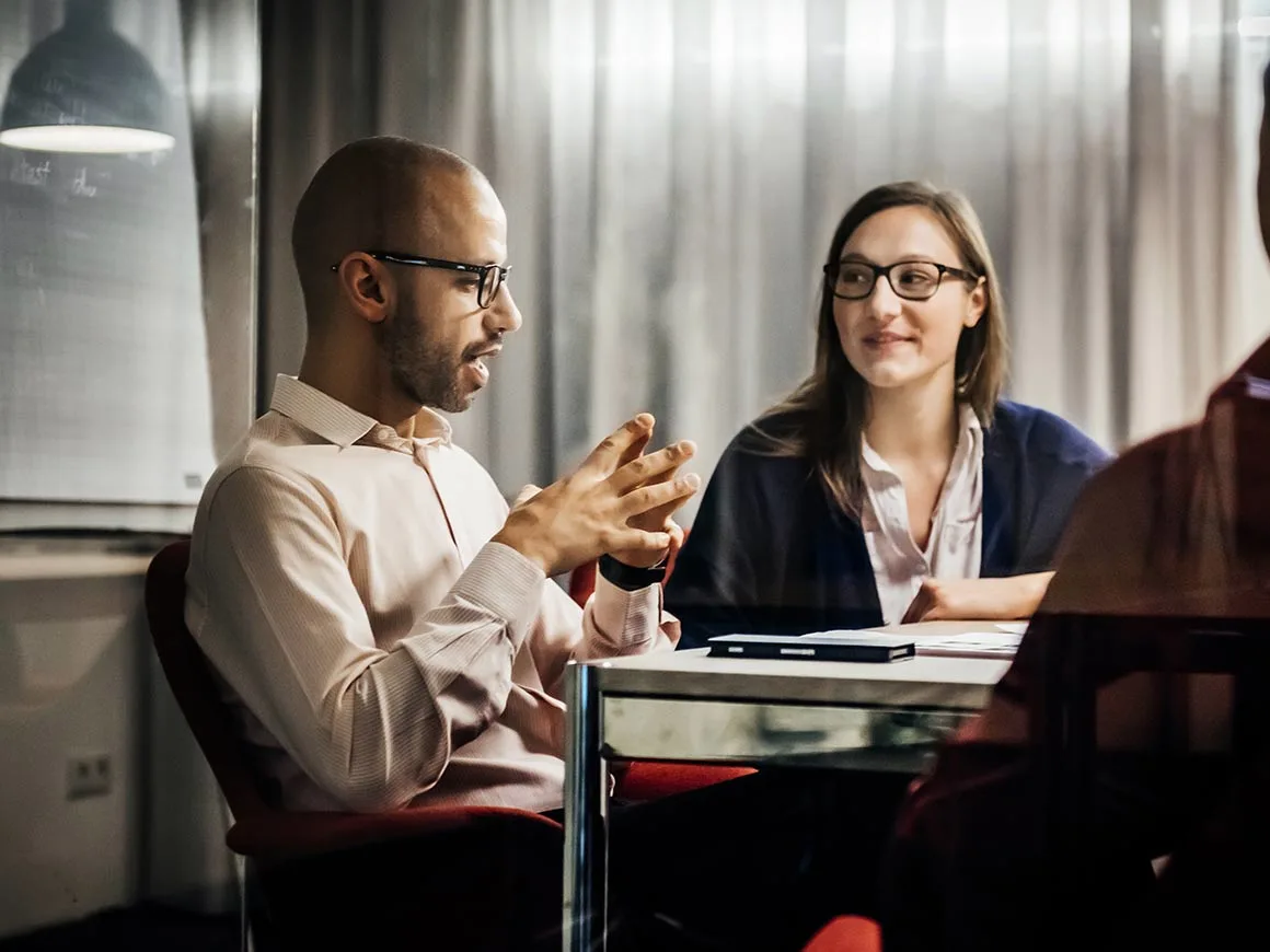 Colleagues meeting in an office