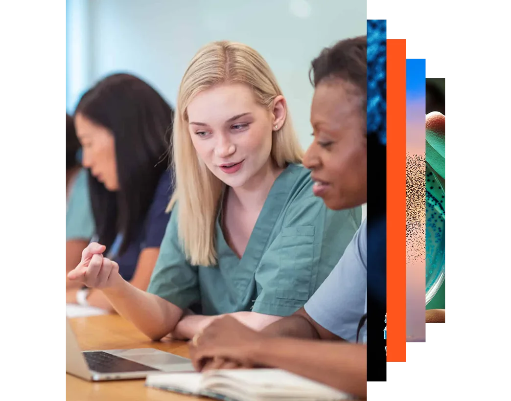 Nurses collaborating on a laptop in a healthcare setting