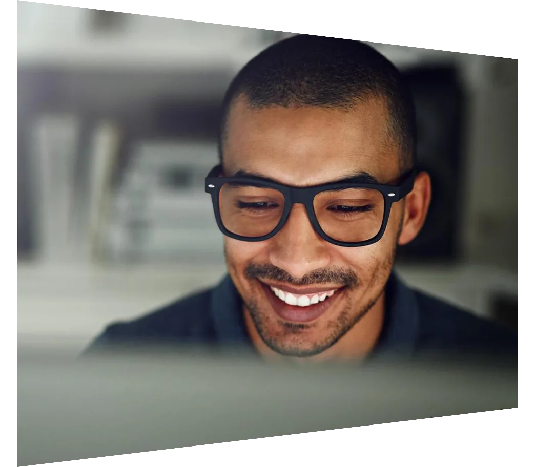 Cropped shot of a businessman using his computer in his home office