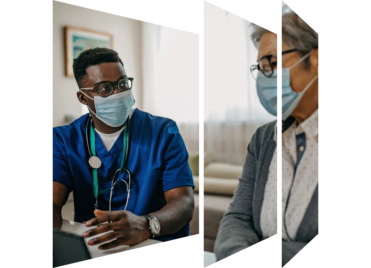 Male doctor talking to a mature female patient