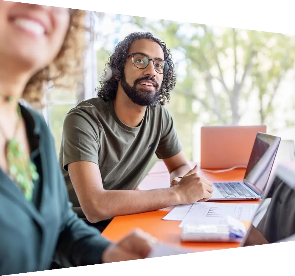 Close up of businessman writing down formulas