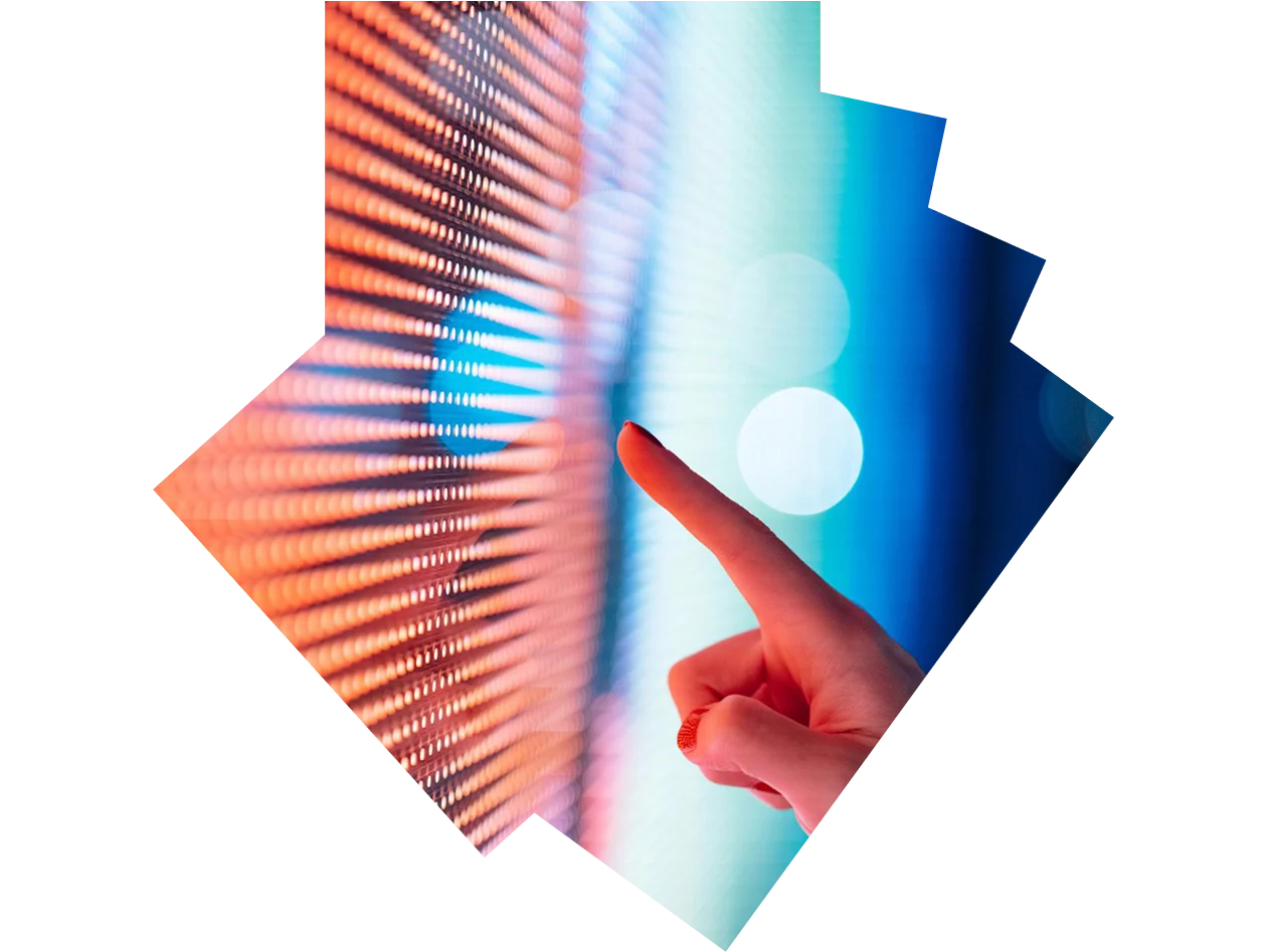 Close-up of female hand touching illuminated digital display in the dark