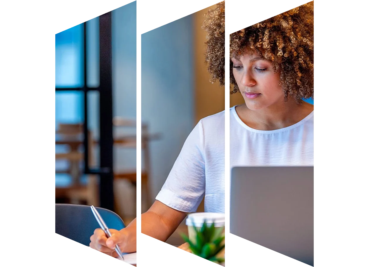 Young woman working on a laptop computer in a modern office