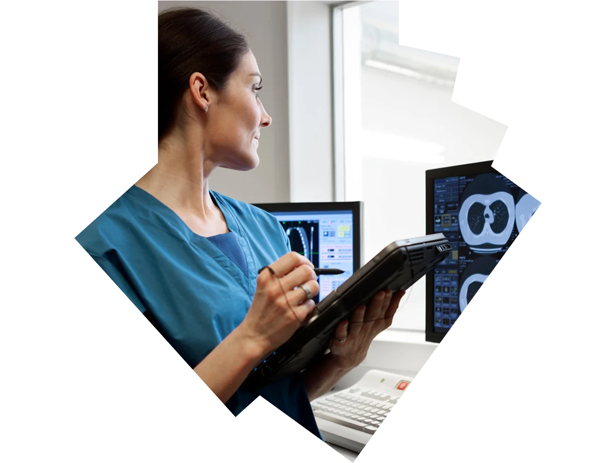 Female radiologist looking at scans