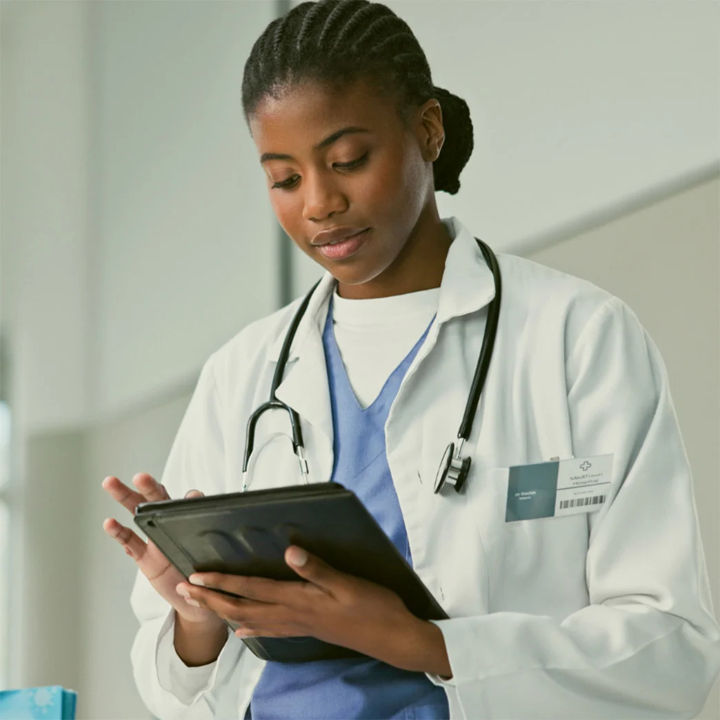 Clinician using tablet to find information