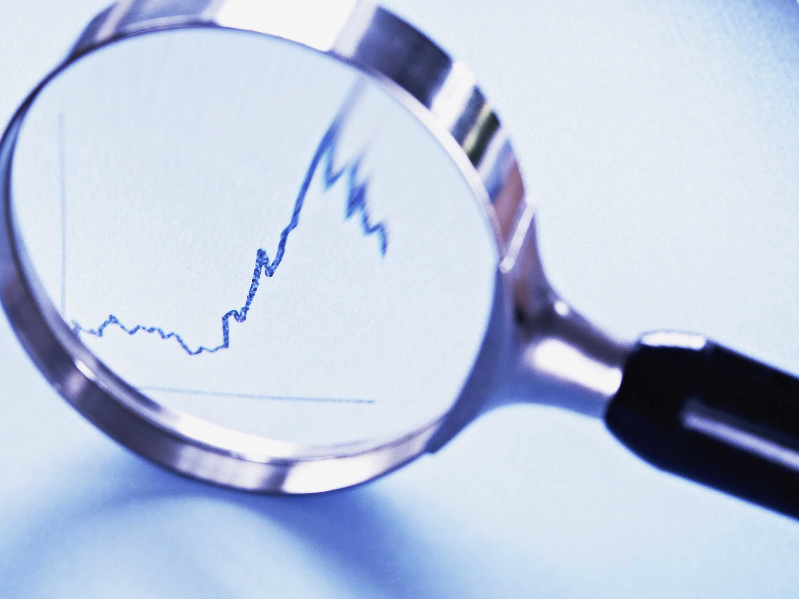 A magnifying glass used to get a closer view of a graph