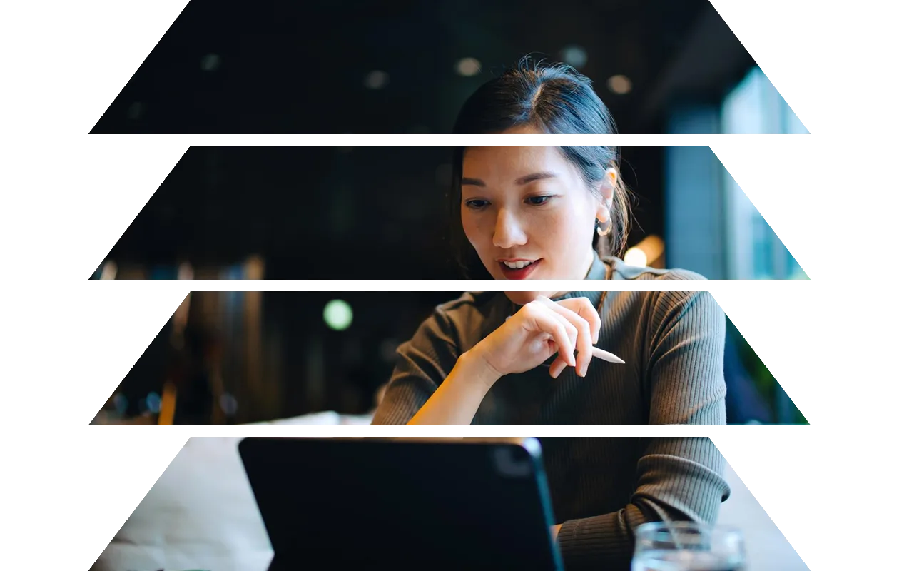 Man in sweater working at desk
