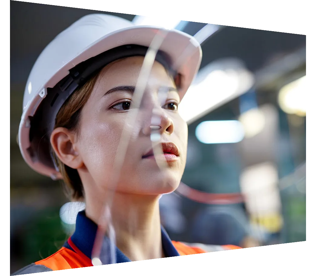 Female quality control engineer checking for manufacturing defects