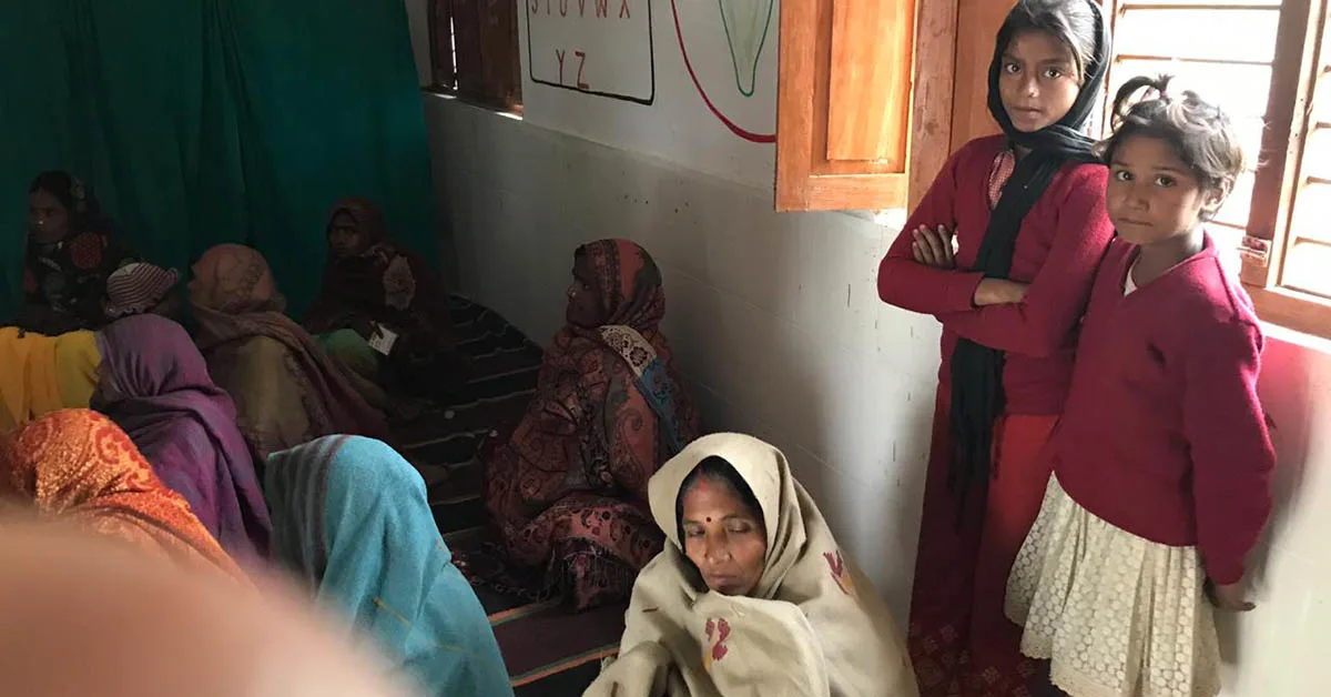 Women wait for a consultation with an auxiliary nursing midwife (ANM) at an Anganwadi – a place for providing health consultations for women and children in Indian villages. (Photo by Meera Sani Gupta, Elsevier)