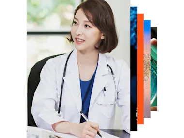 Female doctor with stethoscope looking at a window