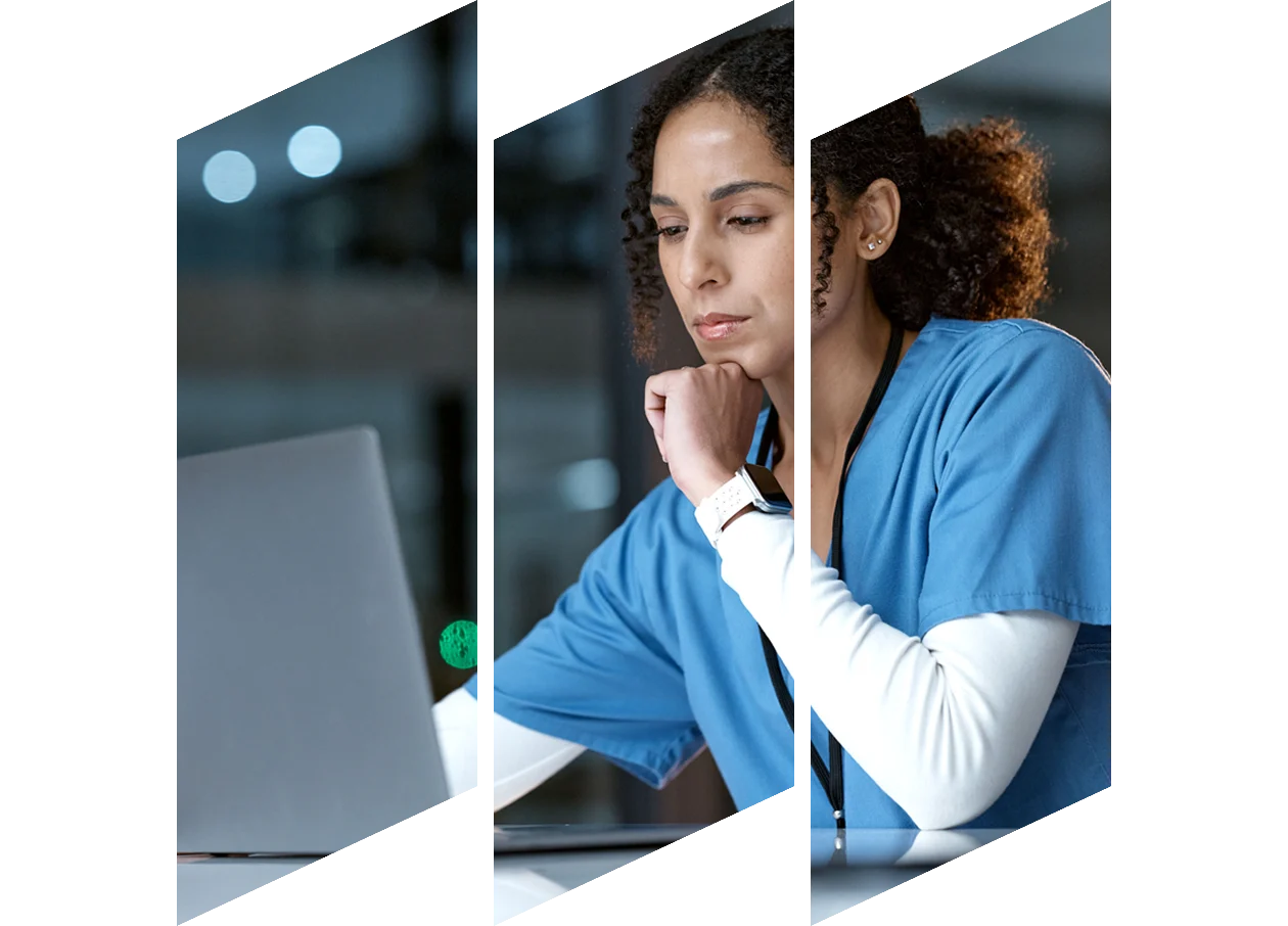 African Pathology Technician working on a computer in the lab