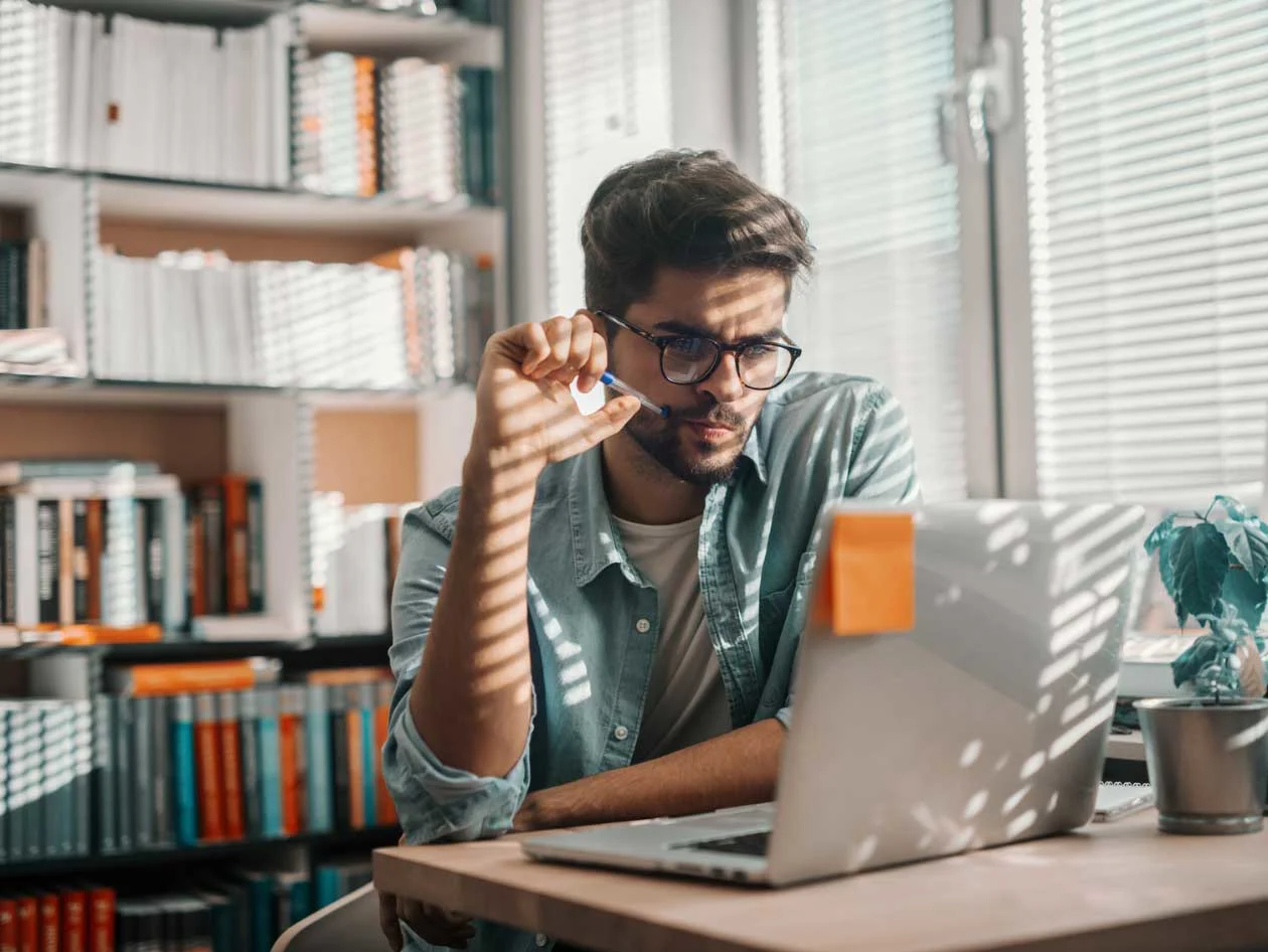 Man in front of laptop working