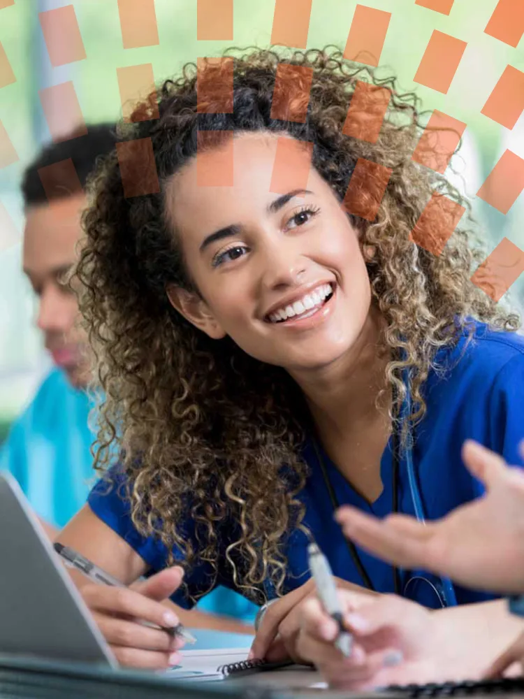Smiling nursing student in a classroom