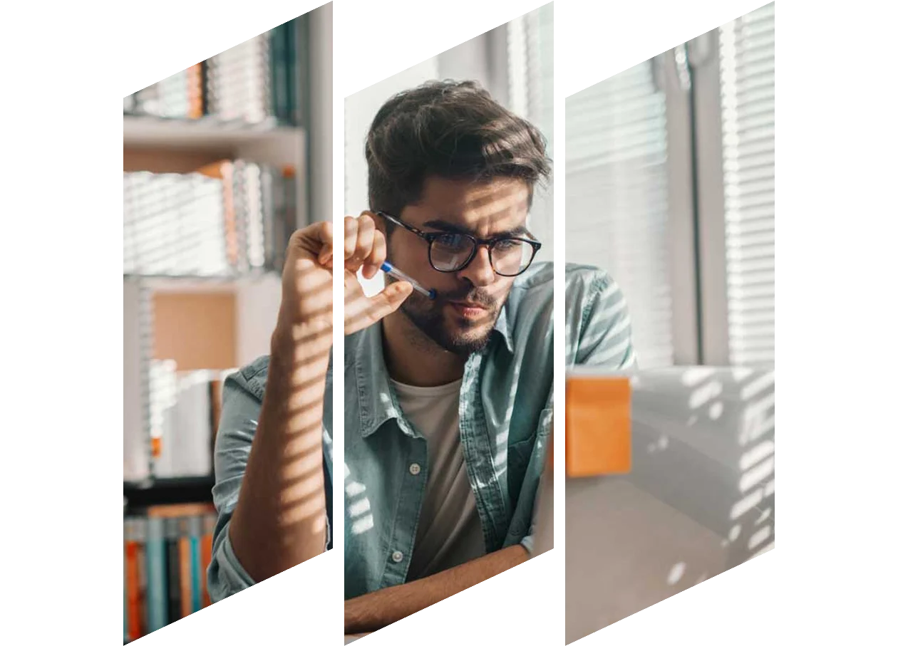 Thoughtful man looking at laptop