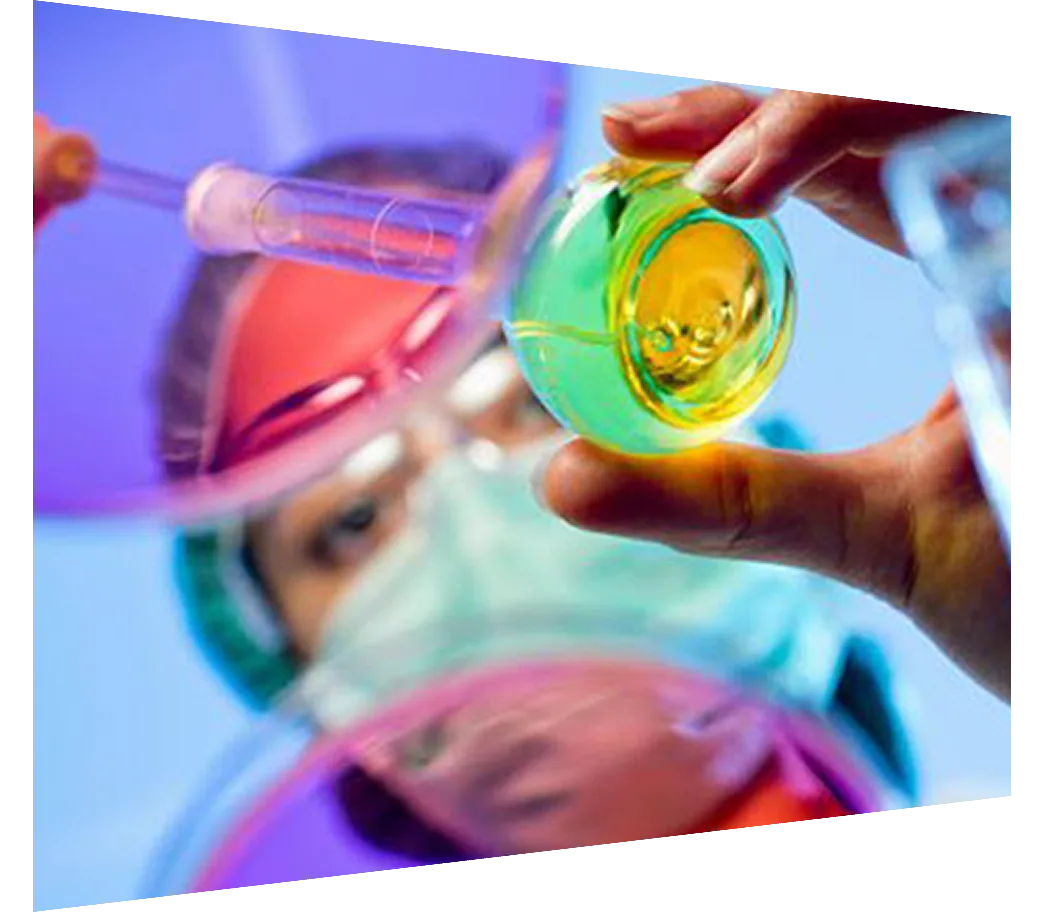 Chemist working in a hospital lab wearing protective gear