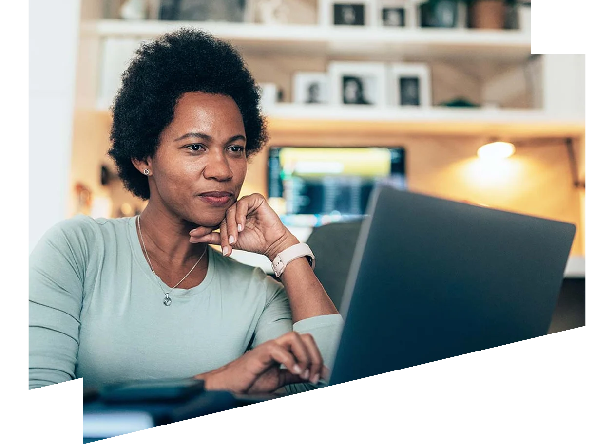 Woman working on laptop at home