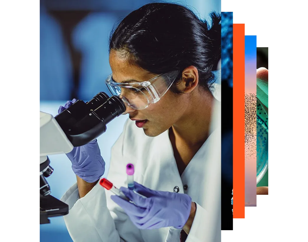 Young scientist looking through a microscope