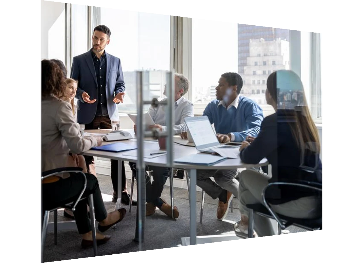 Man drawing on glass whiteboard