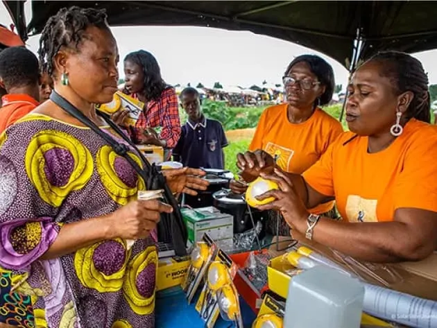 Group of female women in Africa working on scientific tool