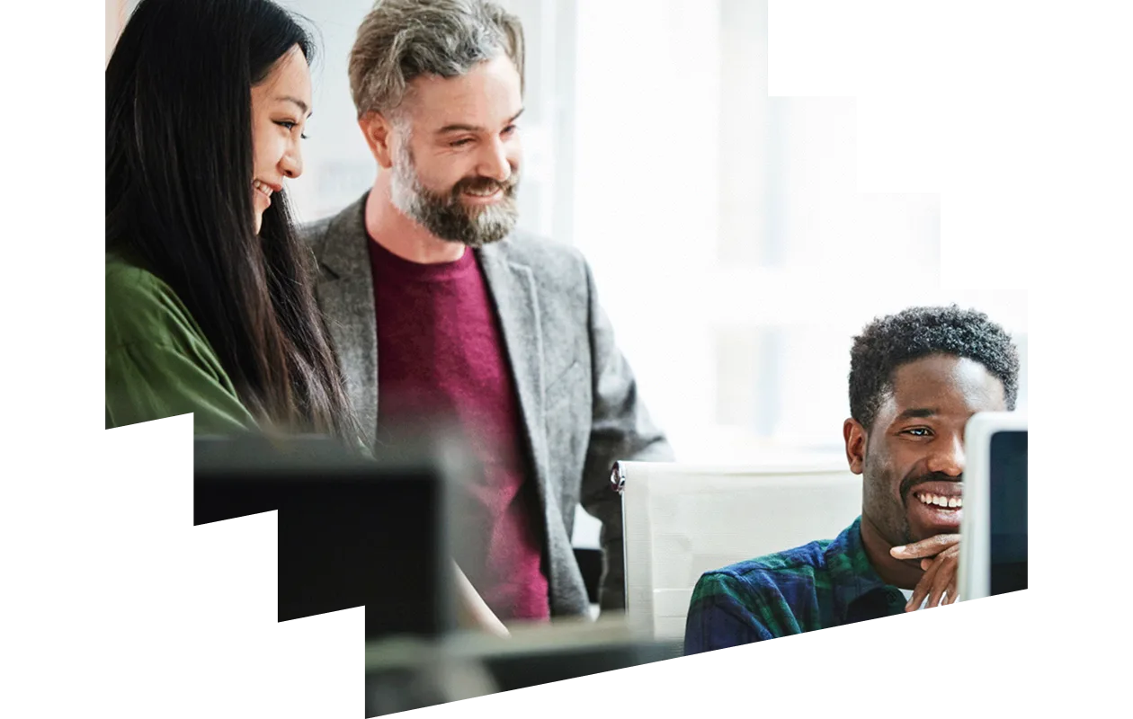 Colleagues around a computer