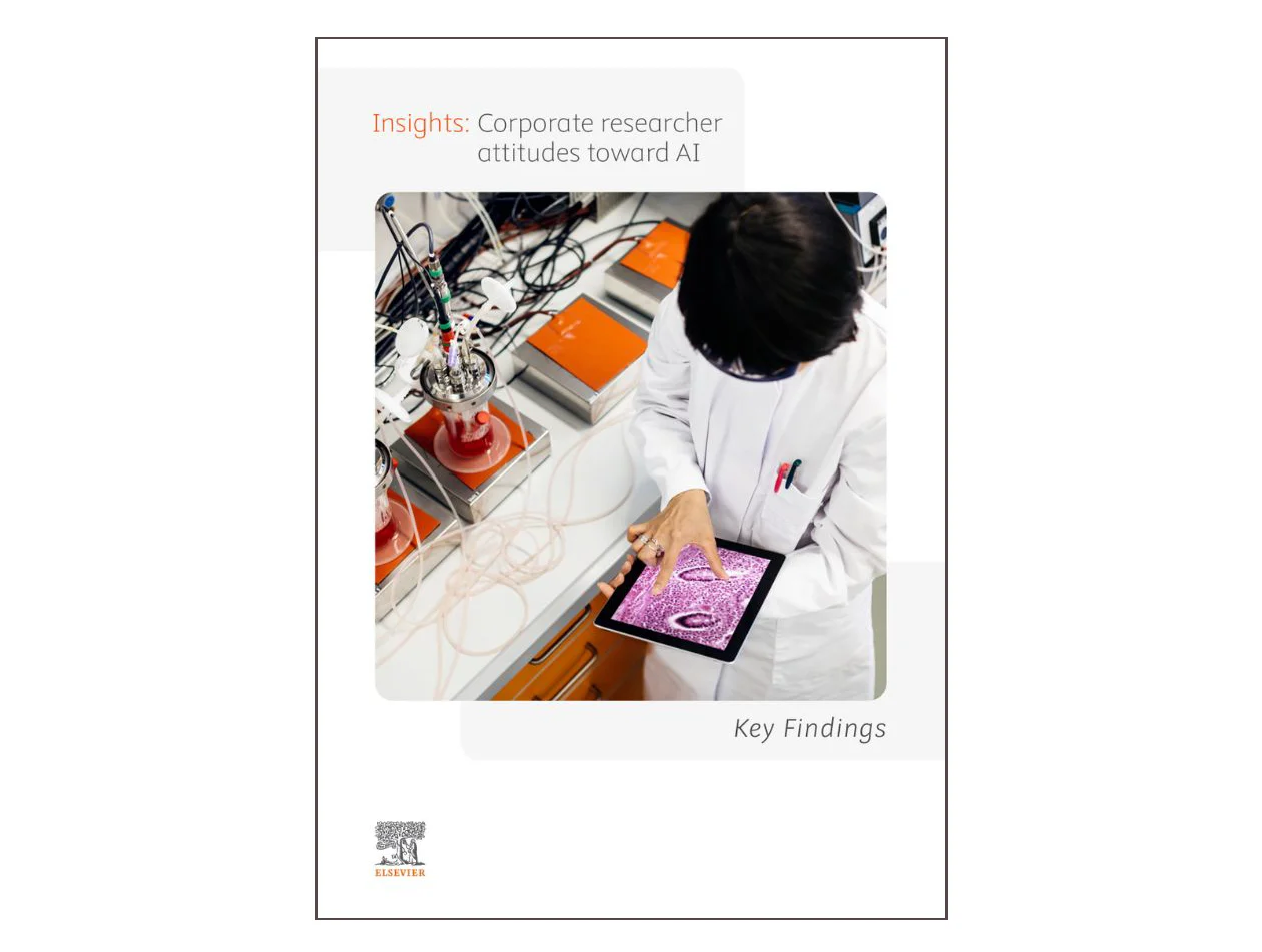 Corporate Researcher AI report - Female researcher enlarging cell photo on tablet