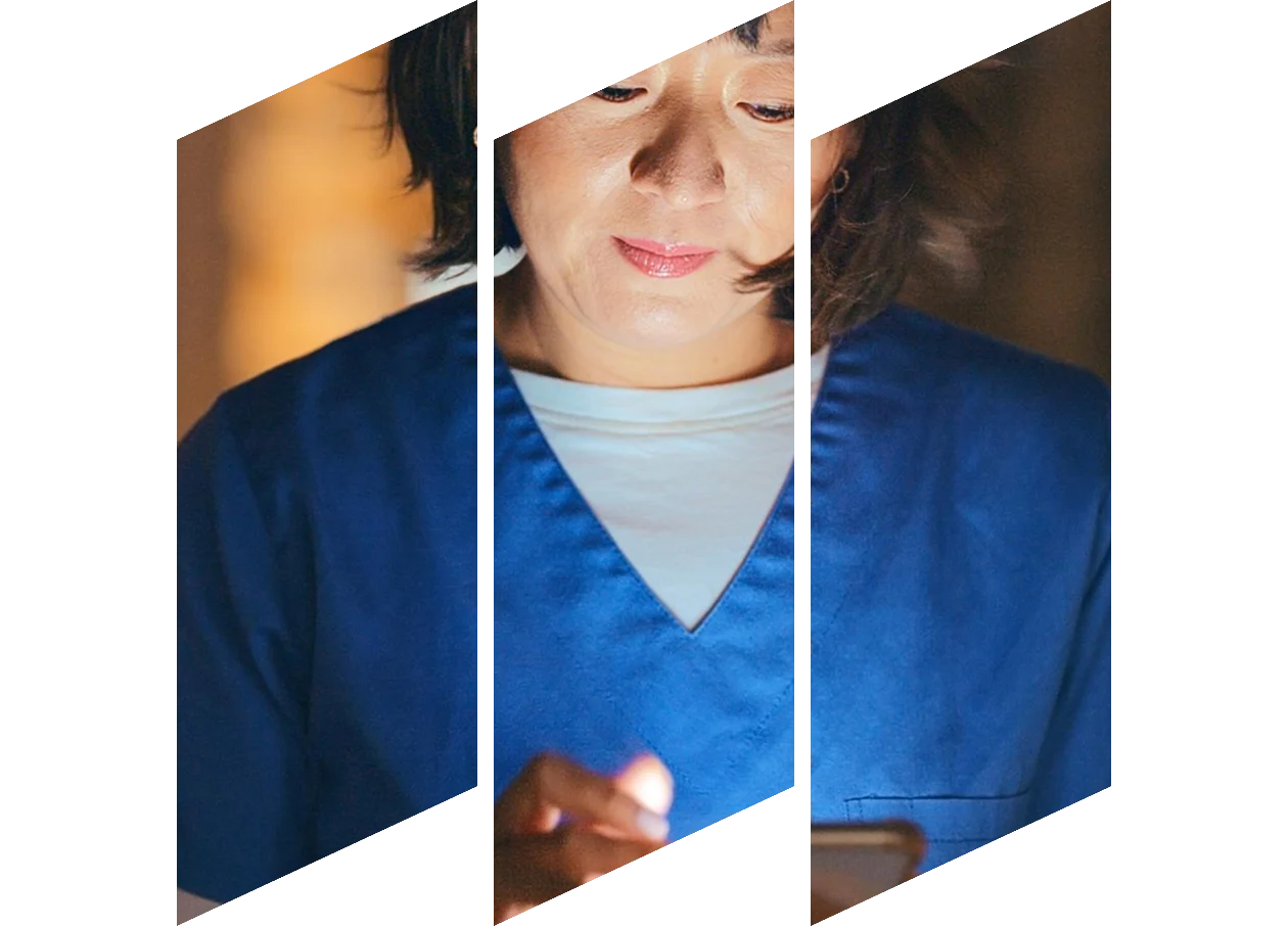 African American nurse working on laptop at her desk