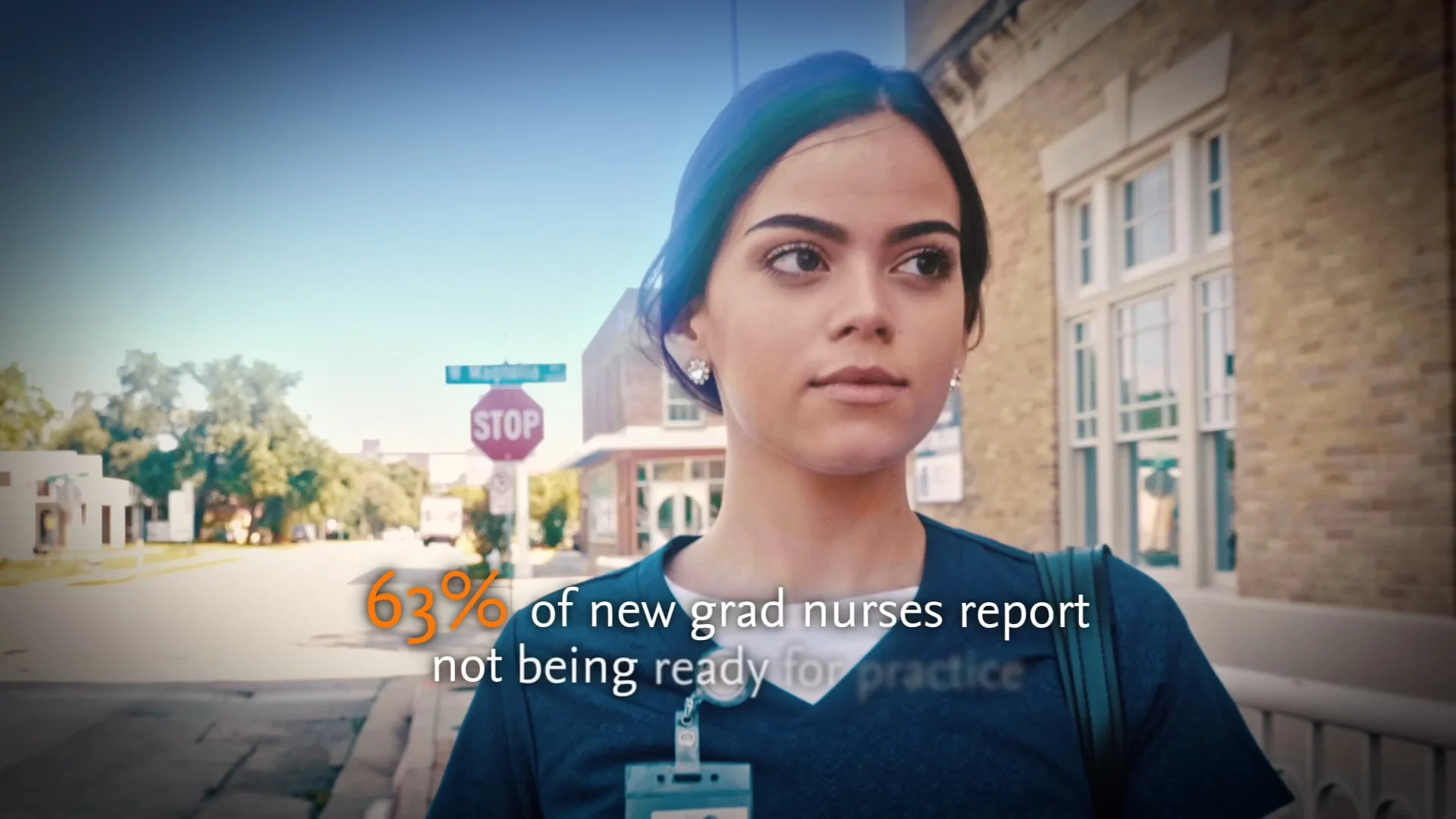 Young female nurse walking down the street. Statistic over the image says "63% of new grad nurses report not being ready for practice."
