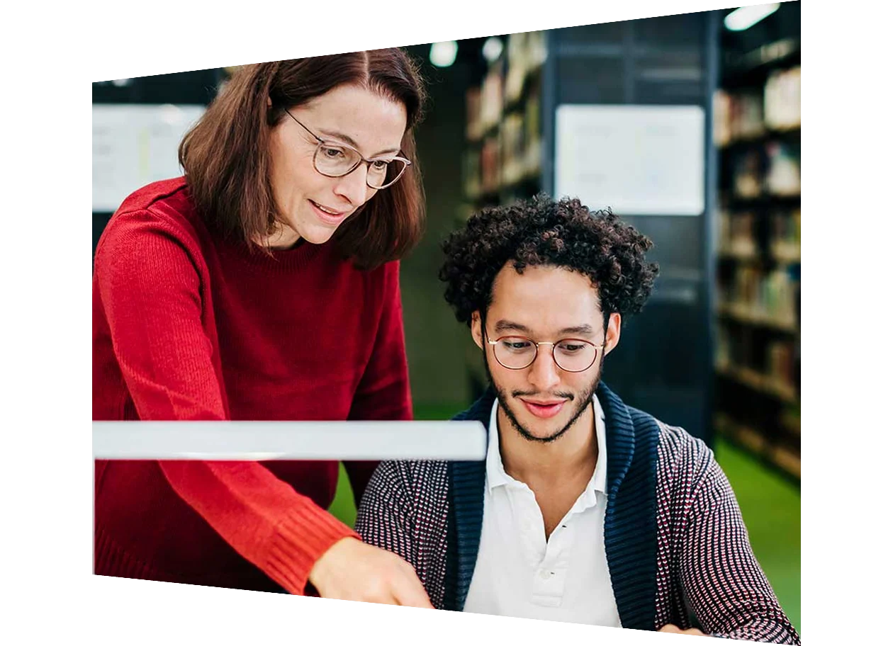 Librarian helping a student