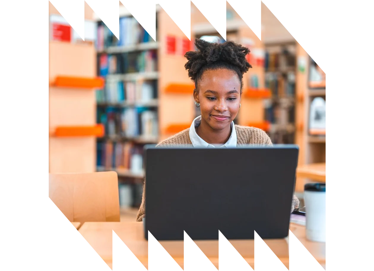Female student working in a public library