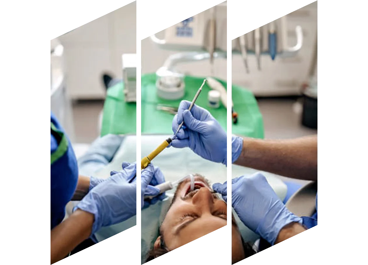 Close-up of two dentists working on a patient