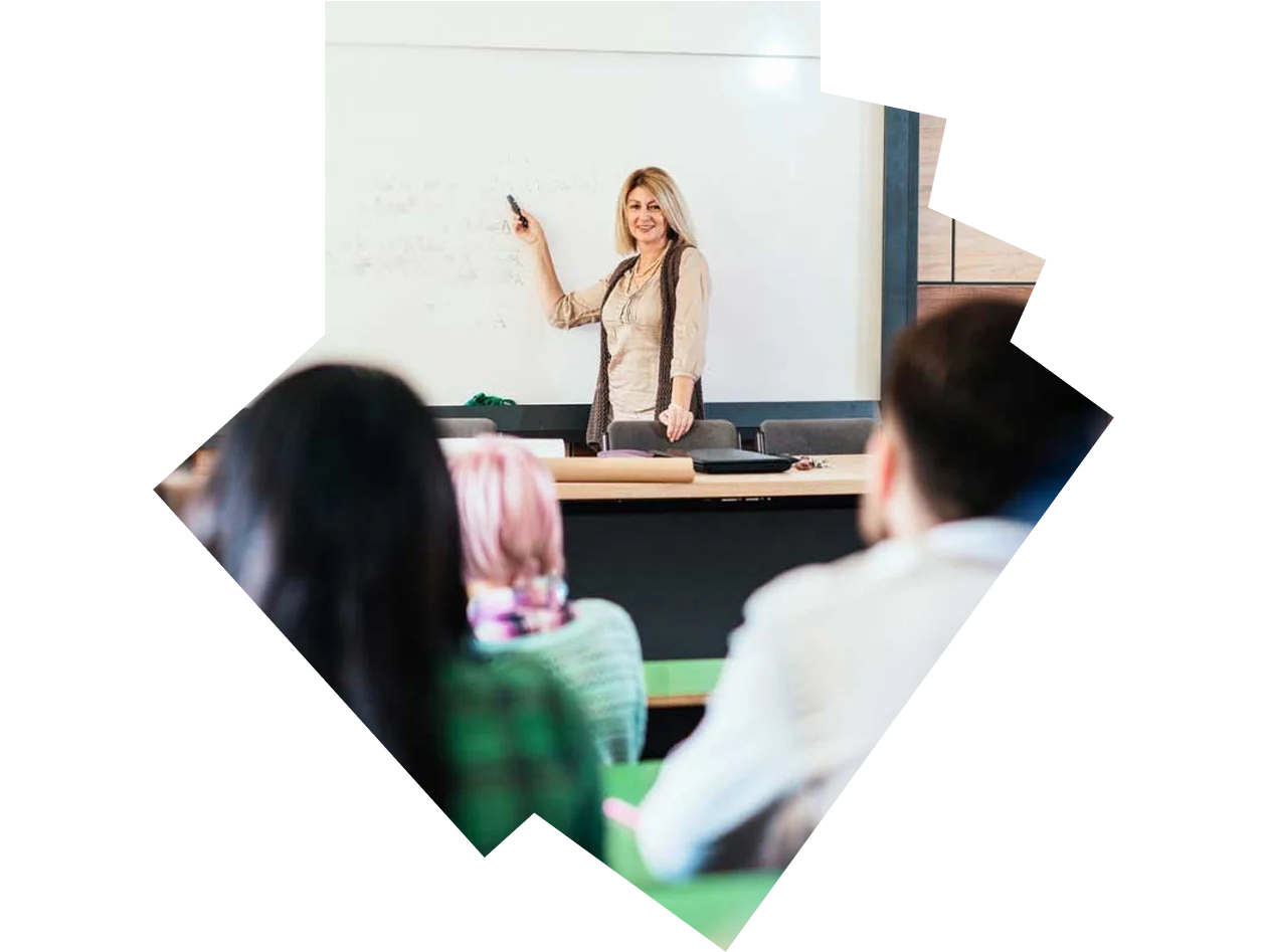 Teacher standing in front of a whiteboard