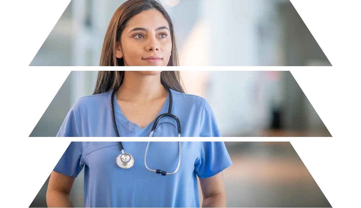 Nurse in blue scrubs looking thoughtful