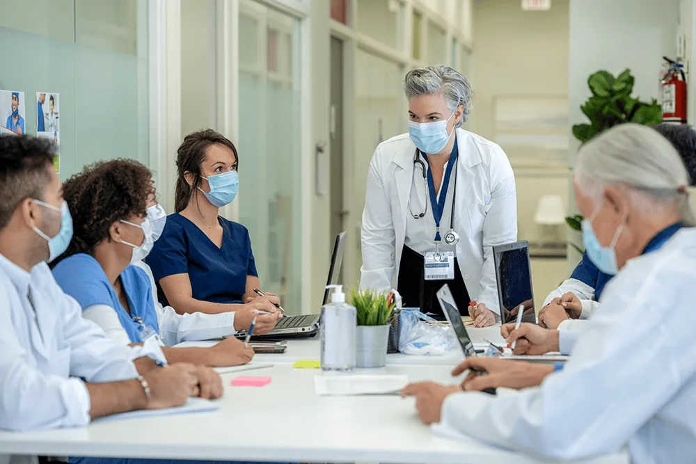 Doctors around a conference table