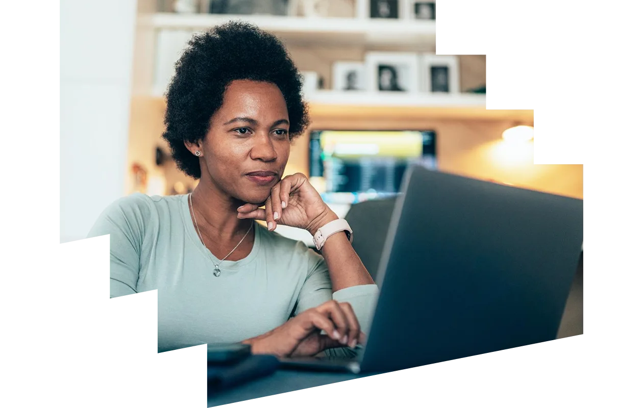 Woman working on her laptop at home