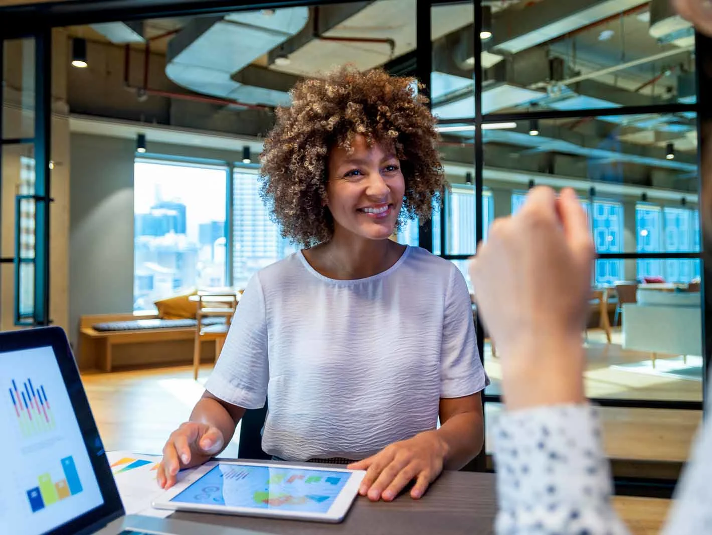 Female discussing data with a colleague