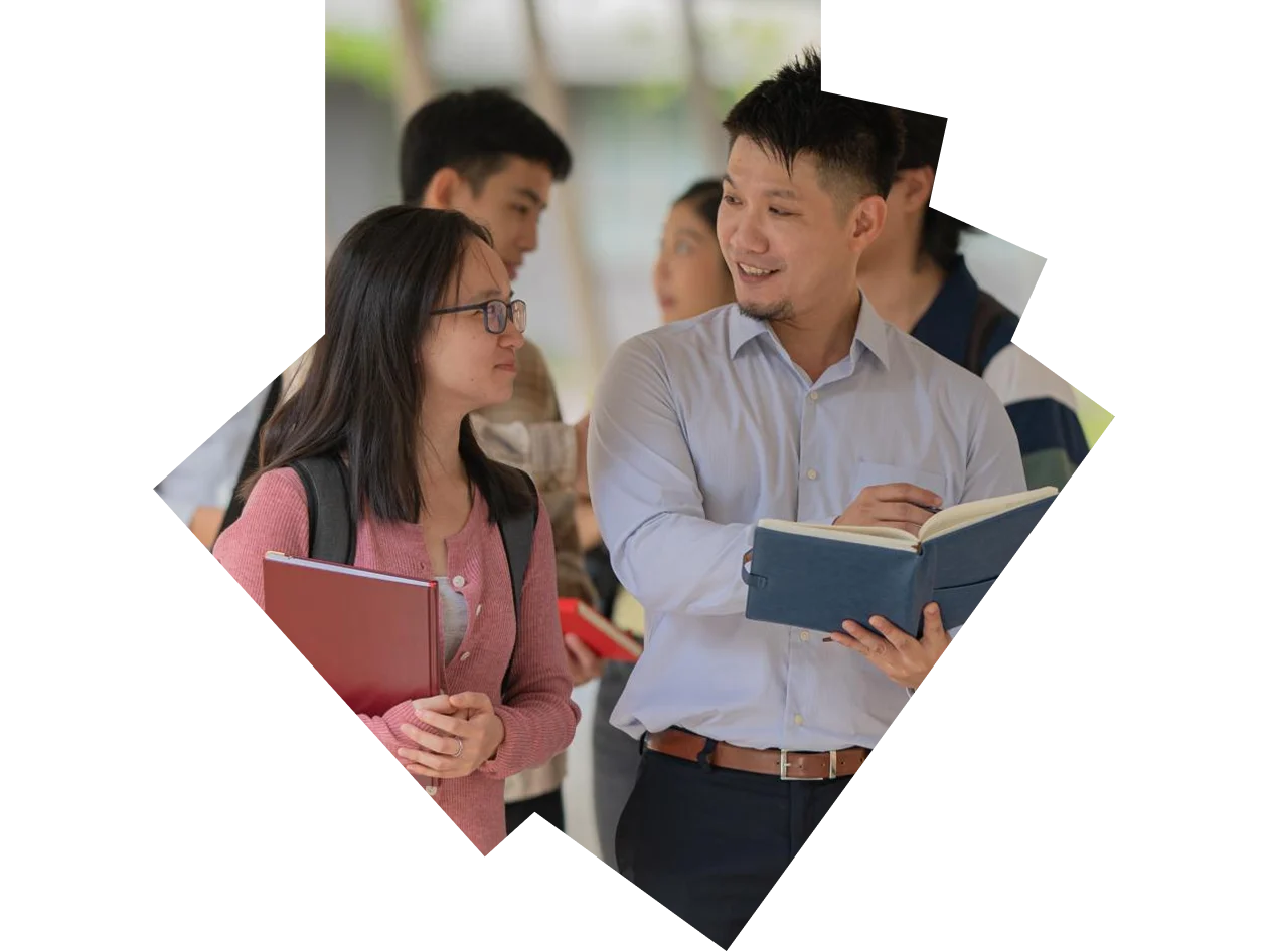 Students and educator walking down a hallway