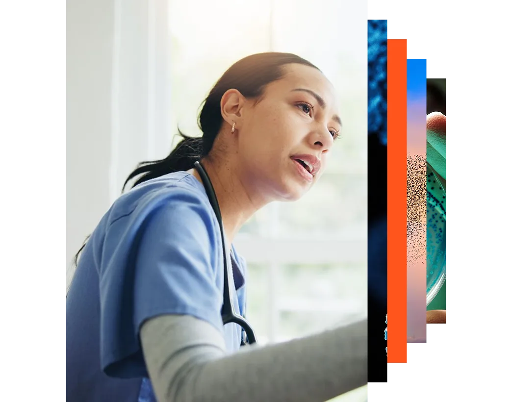 Female caregiver listening to an elderly patient in a wheelchair